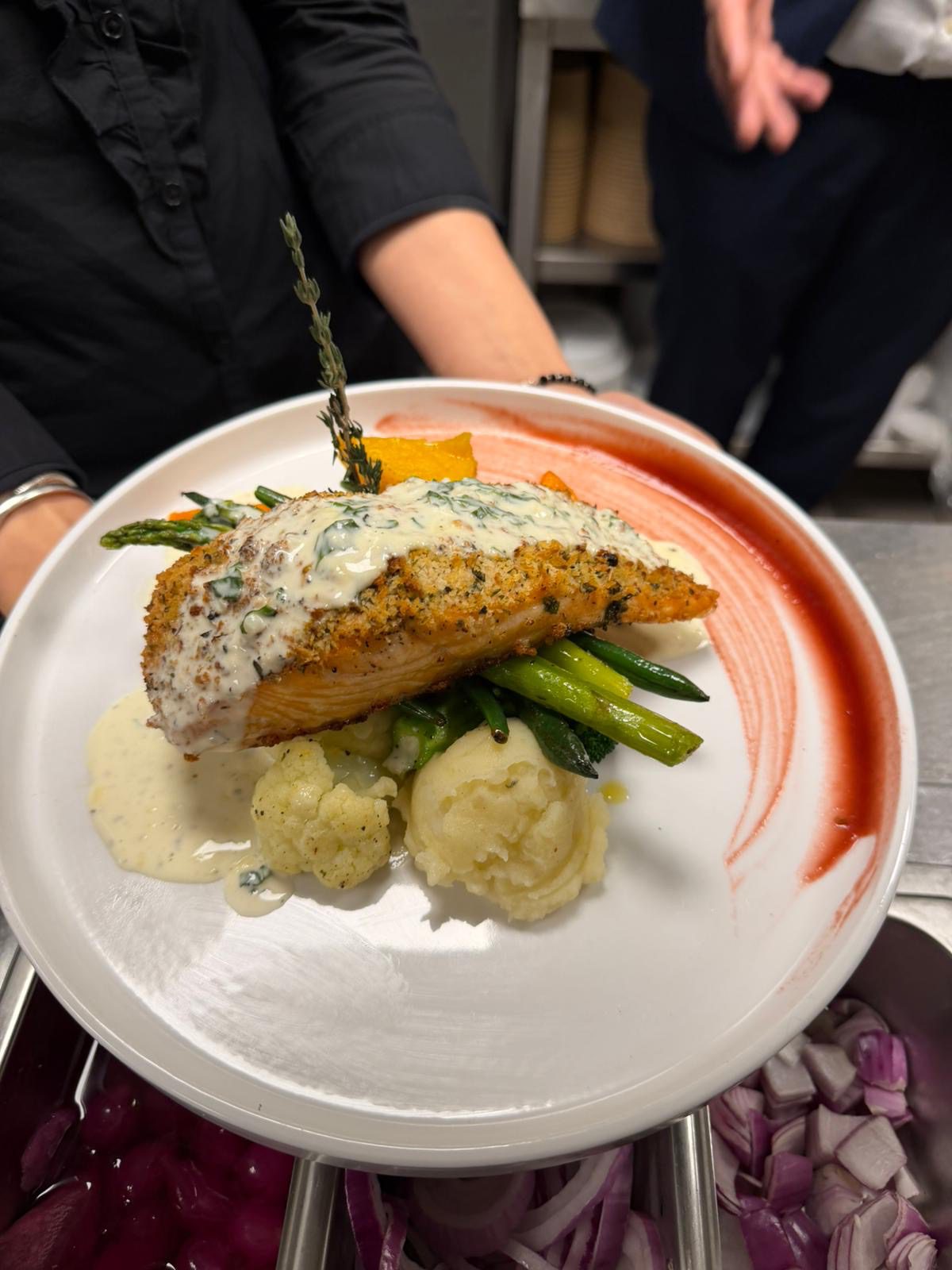 Gourmet salmon dish with vegetables