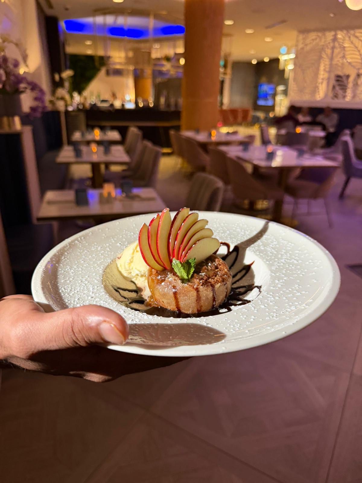 Dessert plate with apple garnish